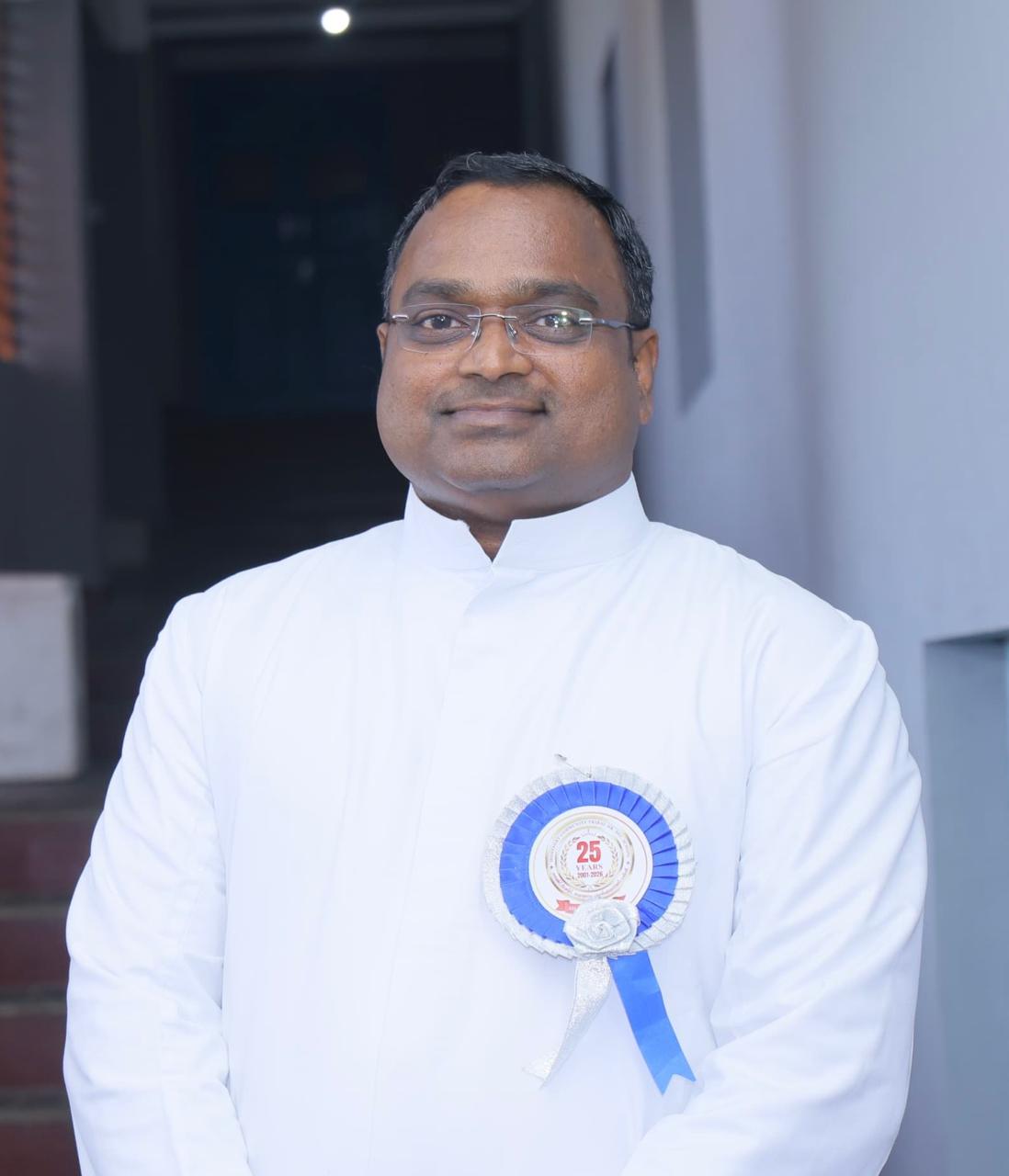 Rev. Dr. J. Vimal — Secretary & Director of LRRC